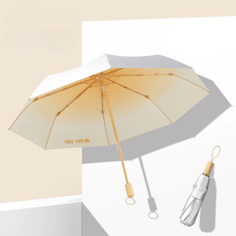 Wholesale titanium silver fabric sunshade umbrella, manual three-fold, UV protection, sun-blocking folding umbrella